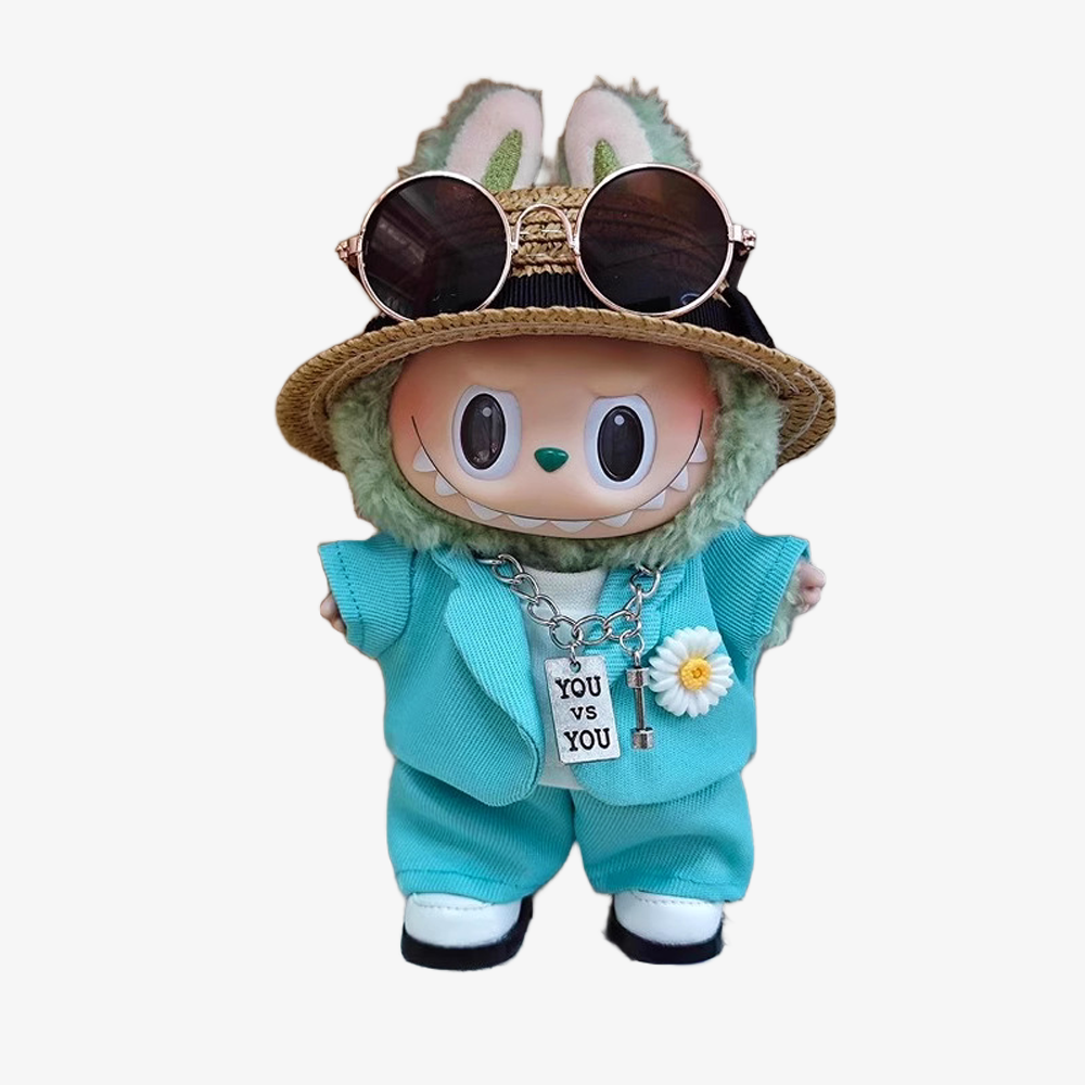 Labubu wearing a handmade G-Dragon inspired outfit – bold K-pop streetwear style with detailed accessories. Custom styles for Exciting Macaron, Big into Energy, and Have a Sit. Blue Mint Outfit. Front view.