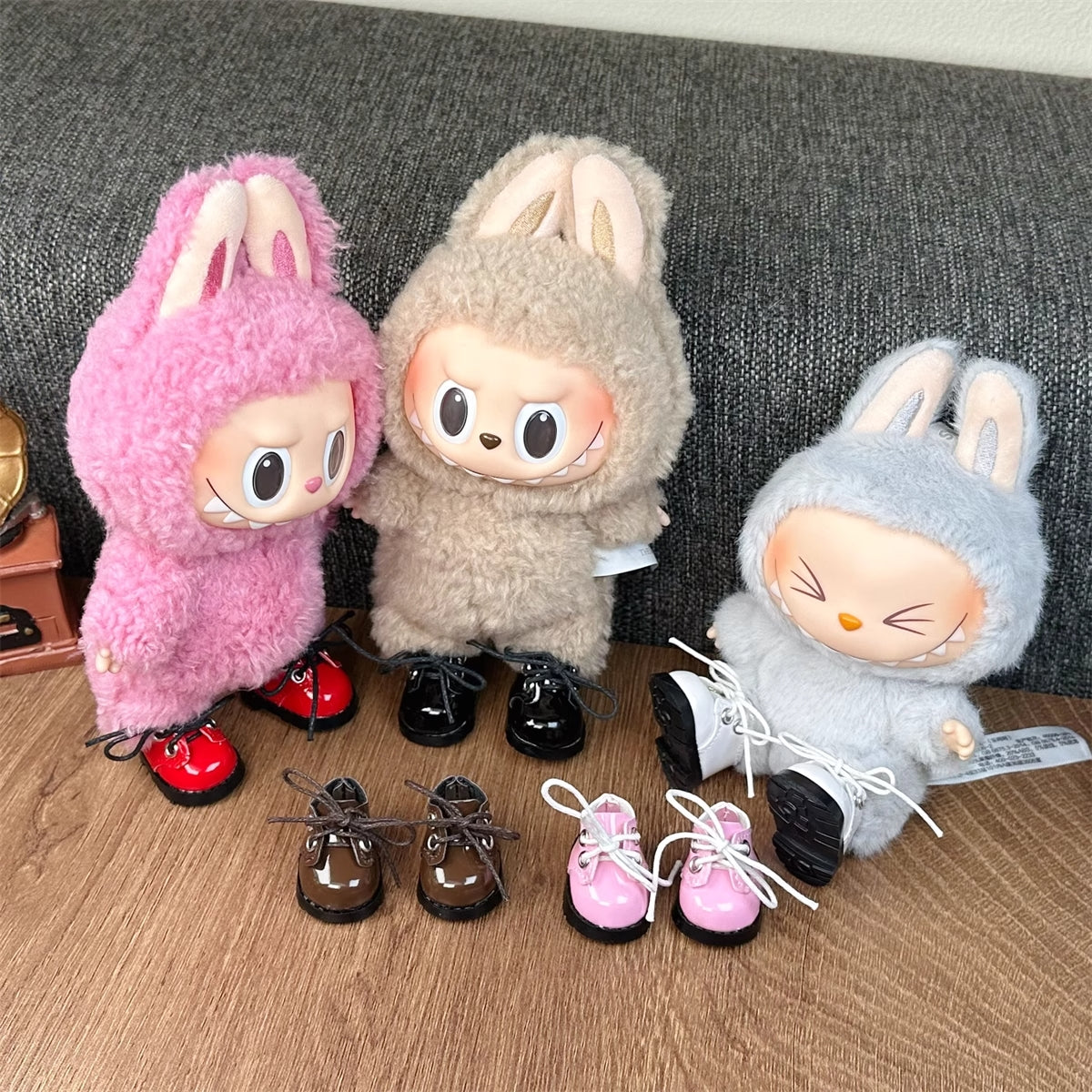 Handmade designer clothes for Labubu figures from The Monsters series – custom styles for Exciting Macaron, Big into Energy, and Have a Sit. On Labubu
