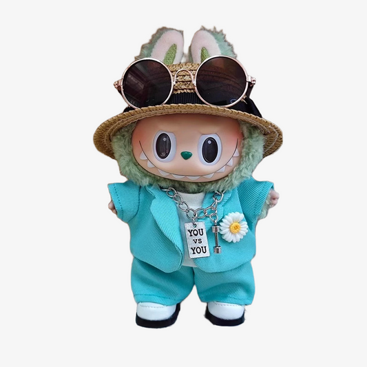 Labubu wearing a handmade G-Dragon inspired outfit – bold K-pop streetwear style with detailed accessories. Custom styles for Exciting Macaron, Big into Energy, and Have a Sit. Blue Mint Outfit. Front view.